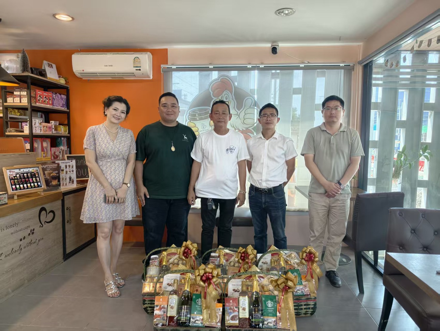 BDC and its partners conduct monthly visits to community leaders near QHI01, presenting household essentials for distribution to locals in the Khlong Tamru community.