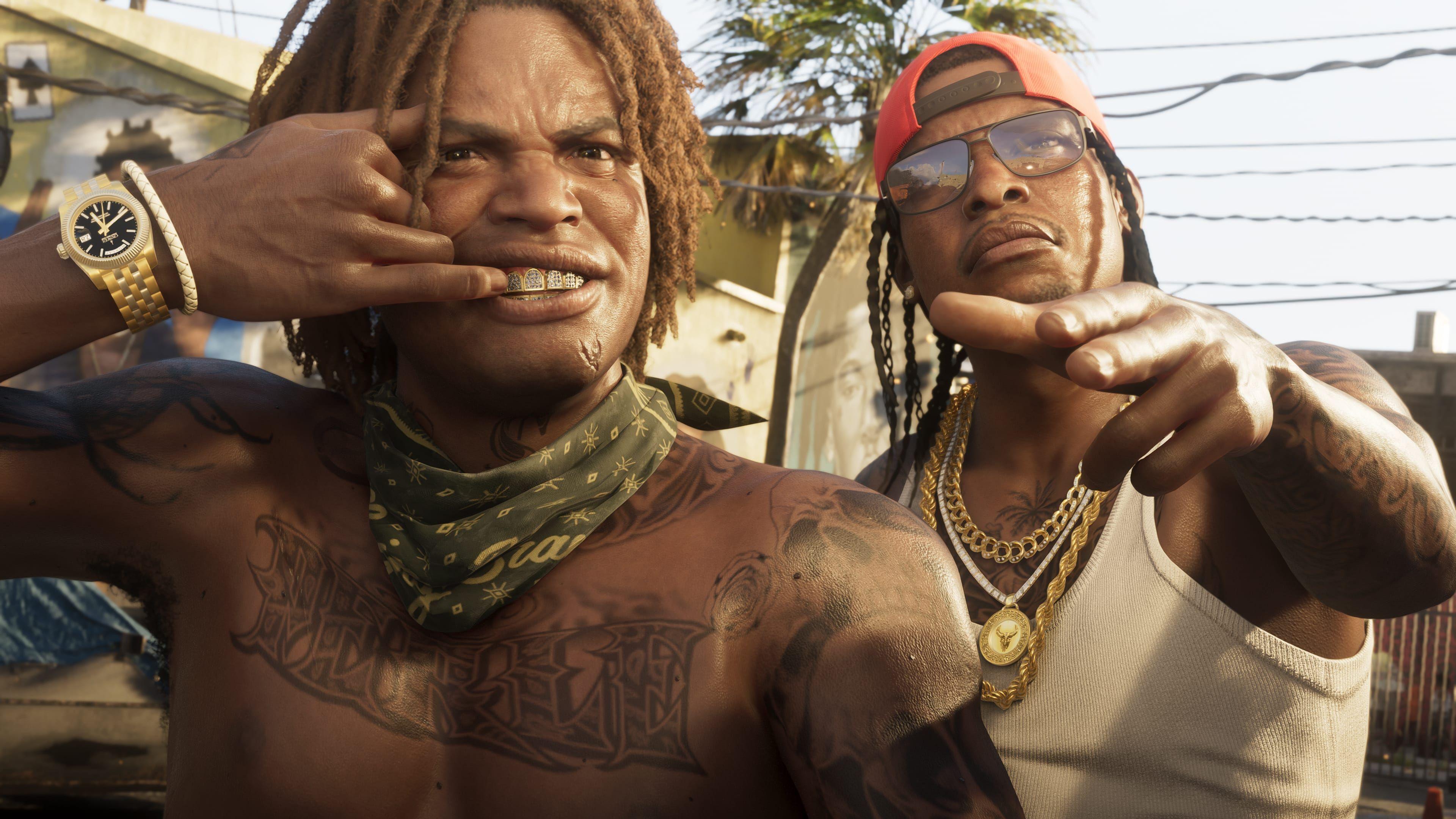 ตัวละครสองตัวจาก GTA 6 กำลังกวักมือเรียกผู้ดู คนหนึ่งสวมนาฬิกาสีทองหนักอึ้ง ดึงริมฝีปากด้านบนขึ้นเผยให้เห็นฟันที่หุ้มด้วยทองคำ ชายข้างๆ เขาสวมสร้อยคอทองคำหนาสามเส้น โดยมีเหรียญกลมใหญ่ติดอยู่เส้นหนึ่ง ทั้งสองคนมีรอยสักเต็มตัว ภาพนี้ดูสมจริงอย่างน่าเชื่อถือแม้จะเป็นภาพที่สร้างจากคอมพิวเตอร์