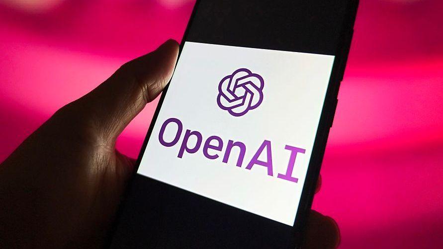 มือถือที่มีโลโก้ OpenAI อยู่บนหน้าจอ