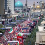 iran-supreme-leader-mashhad-burial-huge-crowds